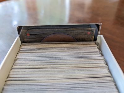 Example of sleeved cards fitting within the container.